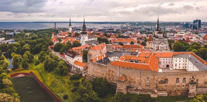 aerial-shot-old-town-tallinn-with-orange-roofs-churches-spires-narrow-streets-2
